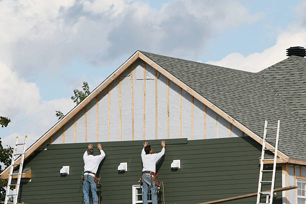 Professional Emergency Siding Repair technician working in Massapequa, NY